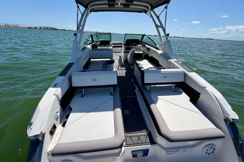 Slide: The Image of 2022 Cobalt R8 Outboard boat with spacious seating on open water. - 19
