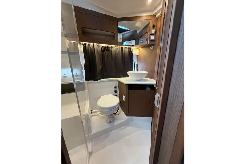 Slide: The Image of Modern bathroom in 2023 Beneteau Antares 11 OB yacht, featuring sleek design and amenities. - 62