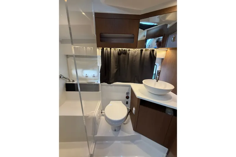Slide: The Image of Modern bathroom in 2023 Beneteau Antares 11 OB yacht, featuring sleek fixtures and wood accents. - 63
