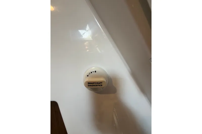Slide: The Image of SmartCraft Diagnostics button on 2023 Beneteau Antares 11 OB boat dashboard. - 71