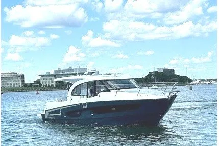 Slide: The Image of 2023 Beneteau Antares 11 OB cruising on a sunny day with blue skies. - 2
