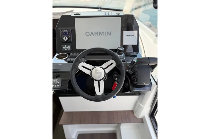 Slide: The Image of Helm of 2023 Beneteau Antares 11 OB with Garmin navigation system. - 39