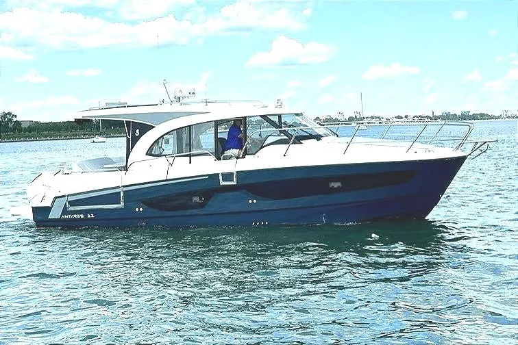 The Image of 2023 Beneteau Antares 11 OB cruising on a calm, sunny day. - 0