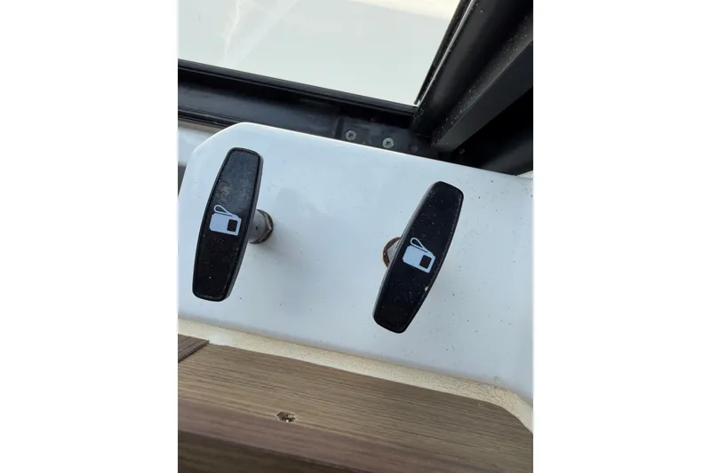 Slide: The Image of Locking mechanisms on 2023 Beneteau Antares 11 OB boat window. - 103