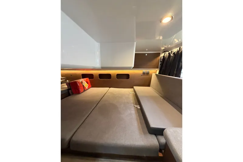 Slide: The Image of Interior cabin of 2023 Beneteau Antares 11 OB, featuring cozy seating and modern design. - 72