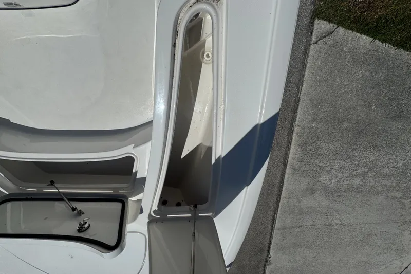 Slide: The Image of 2022 Tidewater 2410 Bay Max boat deck with open storage compartments. - 42