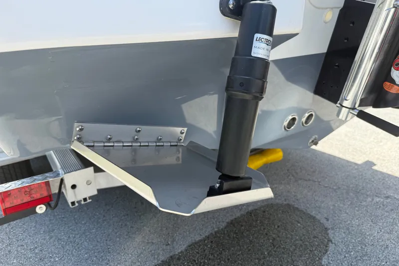 Slide: The Image of 2022 Tidewater 2410 Bay Max boat trim tab and actuator detail. - 49