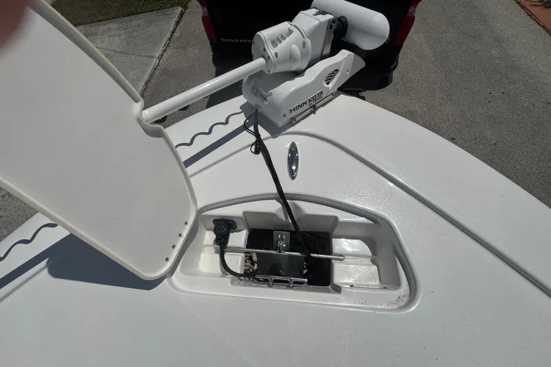 Slide: The Image of Tidewater 2410 Bay Max 2022 boat with Minn Kota trolling motor on deck. - 39