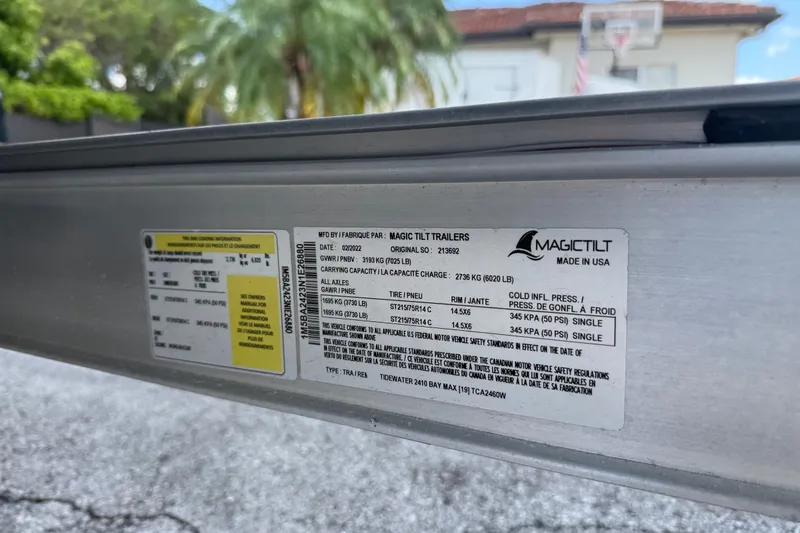 Slide: The Image of Label on Magic Tilt trailer for 2022 Tidewater 2410 Bay Max boat. - 52