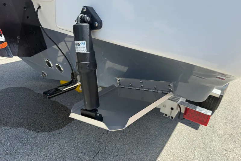 Slide: The Image of 2022 Tidewater 2410 Bay Max boat with trim tab and trailer detail. - 50