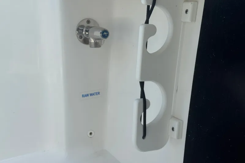 Slide: The Image of Raw water outlet on 2022 Tidewater 2410 Bay Max boat. - 30