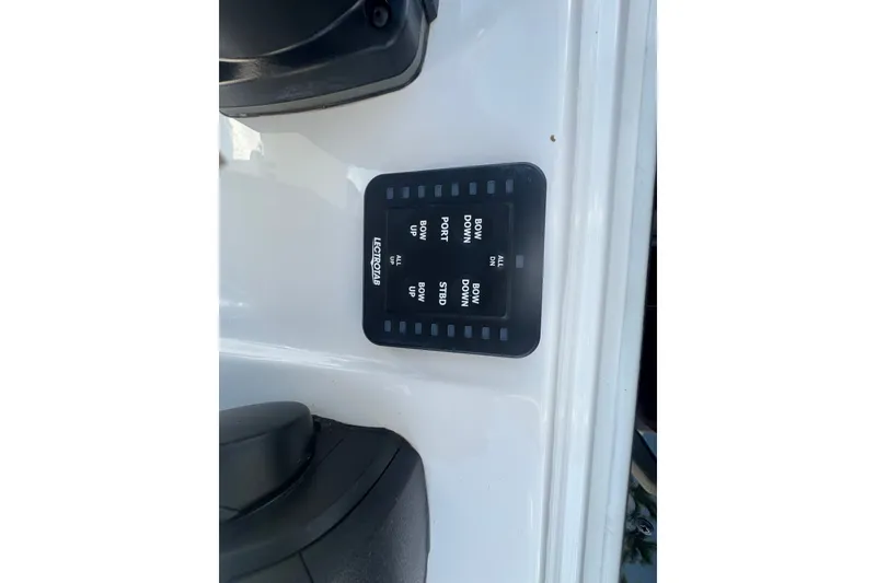 Slide: The Image of Control panel on a 2022 Tidewater 2410 Bay Max boat dashboard. - 26