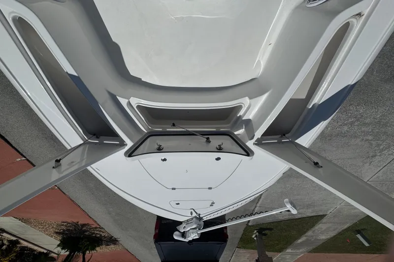 Slide: The Image of Overhead view of a 2022 Tidewater 2410 Bay Max boat on a driveway. - 38