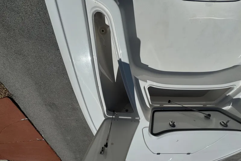 Slide: The Image of 2022 Tidewater 2410 Bay Max boat interior storage compartments. - 41