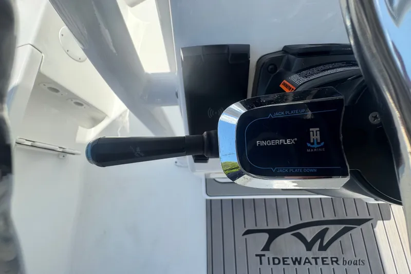 Slide: The Image of Control panel of a 2022 Tidewater 2410 Bay Max boat with FingerFlex jack plate. - 23