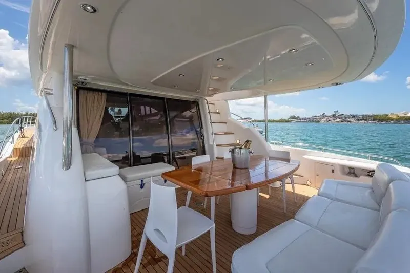 Slide: The Image of Luxurious Sunseeker Manhattan 74 yacht deck with seating and ocean view, 2000 model. - 26