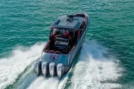 Slide: The Image of 2021 Concept 44' Open Deck boat speeding on water with four powerful engines. - 49
