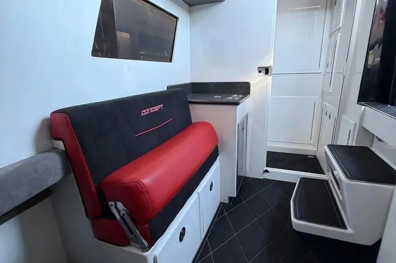 Slide: The Image of Interior of 2021 Concept 44' Open Deck with red seating and modern design. - 57