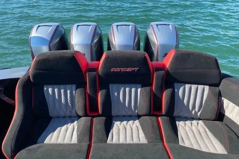 Slide: The Image of Luxury seating on 2021 Concept 44' Open Deck boat with powerful engines in the background. - 32