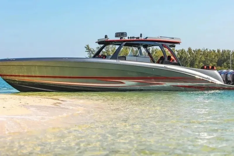 Slide: The Image of 2021 Concept 44' Open Deck boat on sandy shore with clear blue water. - 66