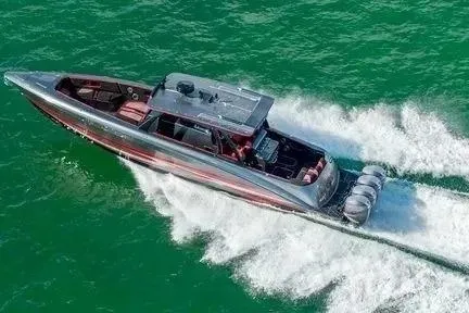 Slide: The Image of 2021 Concept 44' Open Deck boat cruising on vibrant green water. - 48