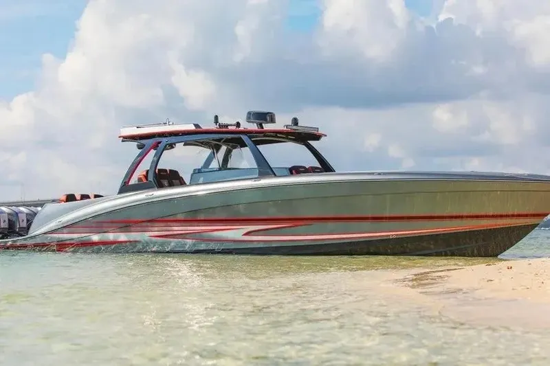 Slide: The Image of Modern 2021 Concept 44' Open Deck boat on sandy shore under cloudy sky. - 59