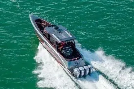Slide: The Image of 2021 Concept 44' Open Deck boat cruising on turquoise water with powerful engines. - 14