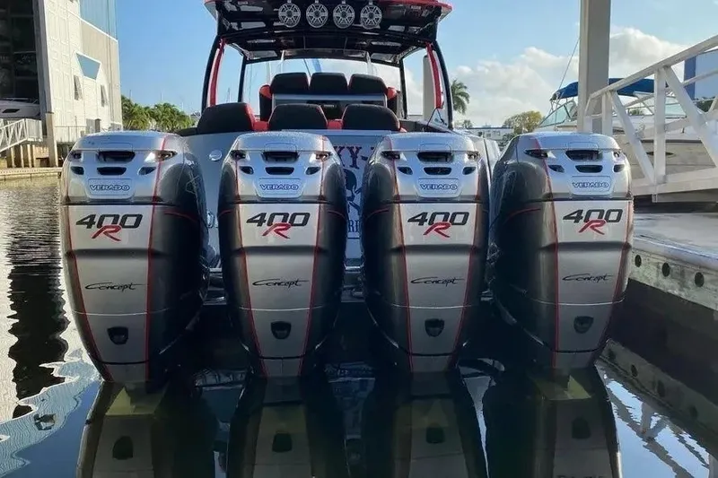 Slide: The Image of 2021 Concept 44' Open Deck boat with four powerful 400R Verado engines docked. - 18