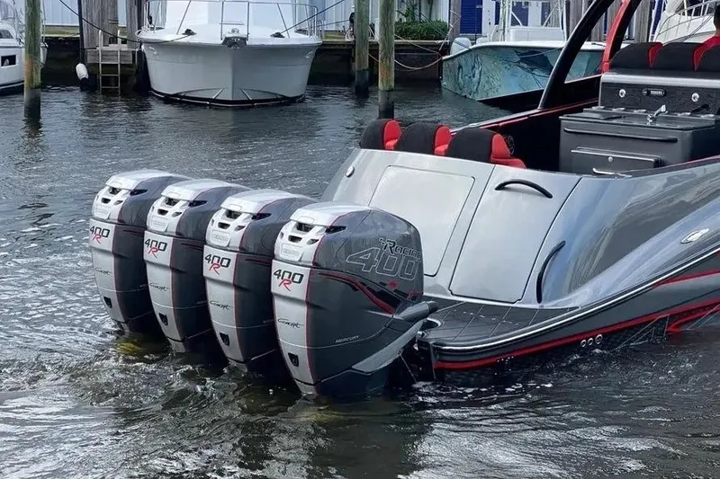 Slide: The Image of 2021 Concept 44' Open Deck boat with four powerful outboard engines in the water. - 16
