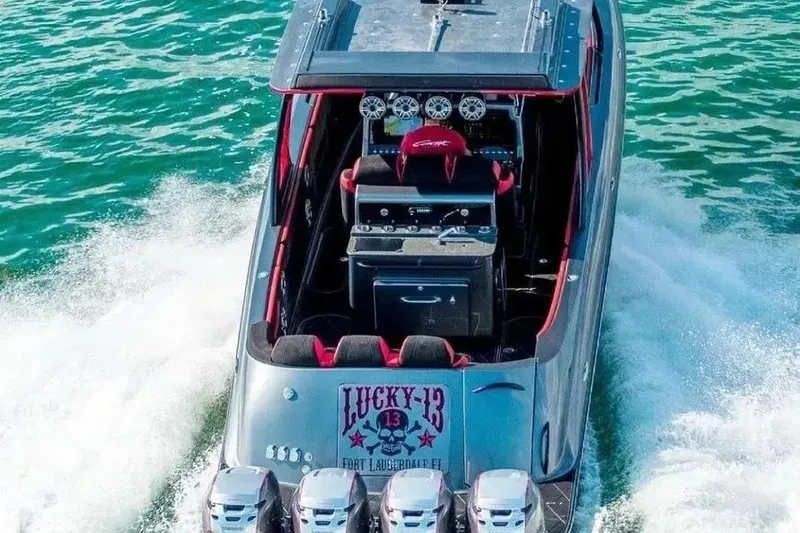 Slide: The Image of 2021 Concept 44' Open Deck boat cruising on water, featuring powerful engines and sleek design. - 37