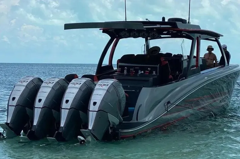 Slide: The Image of 2021 Concept 44' Open Deck boat with four powerful outboard engines on the water. - 25