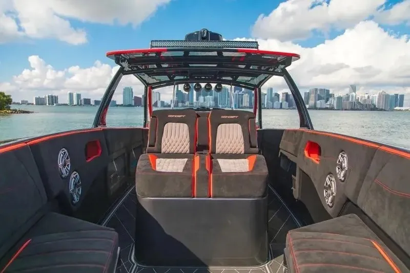 Slide: The Image of Luxurious 2021 Concept 44' Open Deck boat interior with city skyline backdrop. - 63
