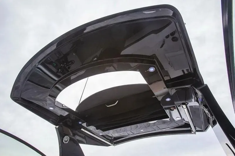 Slide: The Image of 2023 Cruisers Yachts 38 GLS OB hardtop with integrated lighting and sleek design. - 7