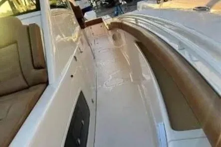 Slide: The Image of 2019 Scout 420 LXF boat interior with sleek design and comfortable seating. - 18