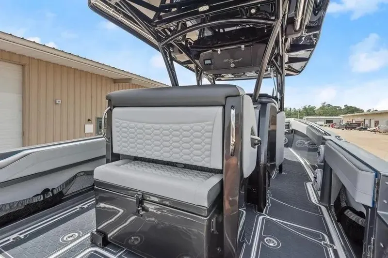 Slide: The Image of 2023 Nor-Tech 390 Center Console boat interior with sleek seating and modern design. - 10