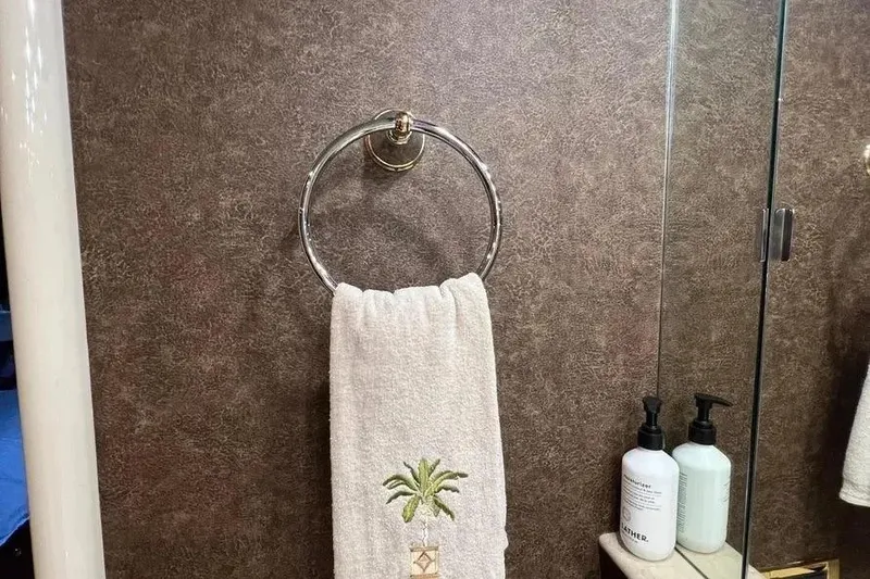 Slide: The Image of Towel ring with embroidered towel in 2004 Lazzara SC Motor Yacht bathroom. - 33