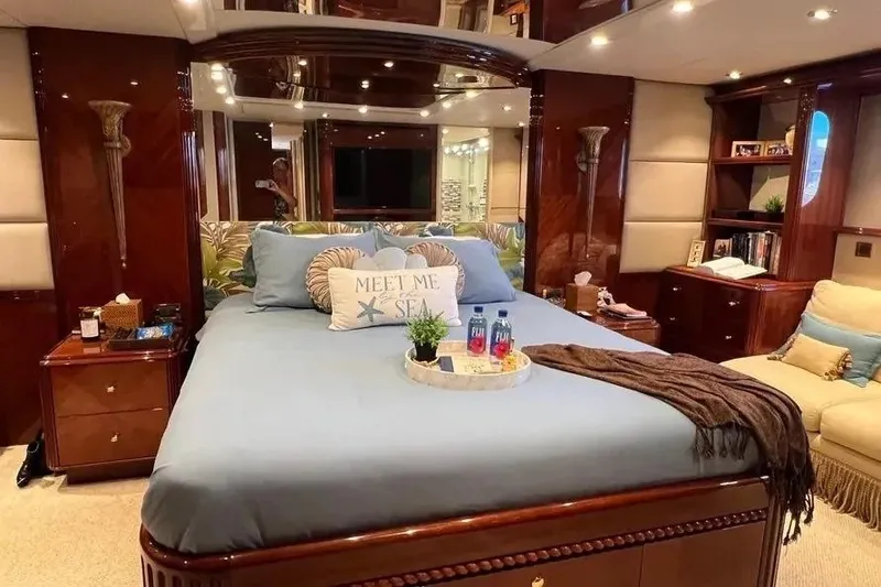 Slide: The Image of Luxurious bedroom interior of 2004 Lazzara SC Motor Yacht with elegant decor and cozy bedding. - 30