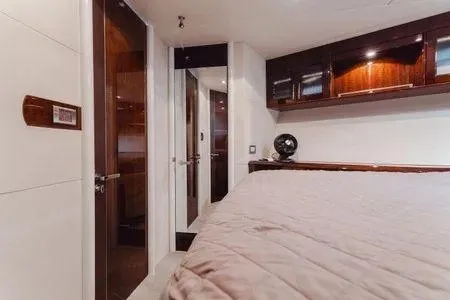 Slide: The Image of Luxurious cabin interior of 2007 Lazzara LSX 75 yacht with elegant wood finishes. - 18