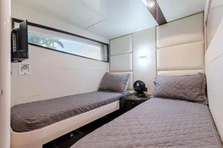 Slide: The Image of Interior cabin of 2007 Lazzara LSX 75 yacht with twin beds and modern decor. - 37