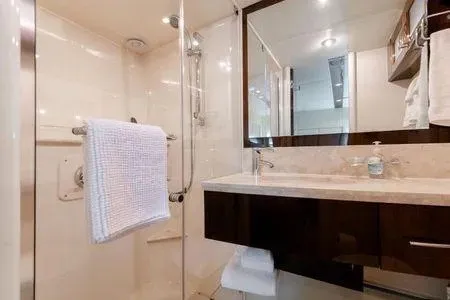 Slide: The Image of Luxurious bathroom in 2007 Lazzara LSX 75 yacht with modern fixtures and elegant design. - 40