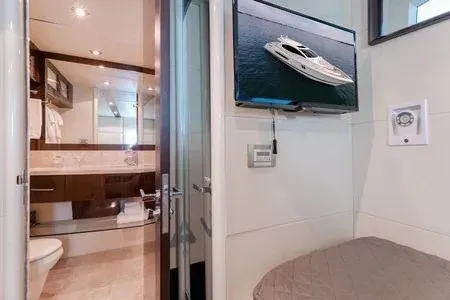 Slide: The Image of Interior of 2007 Lazzara LSX 75 yacht with modern bathroom and wall-mounted TV. - 41