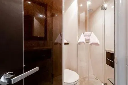 Slide: The Image of Luxurious bathroom in 2007 Lazzara LSX 75 yacht with modern fixtures and elegant design. - 16