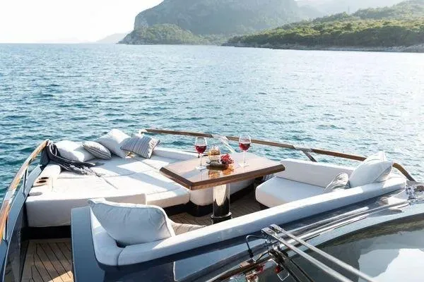 Slide: The Image of Luxurious 2023 Lazzara LSX 67 yacht deck with elegant seating and ocean view. - 25