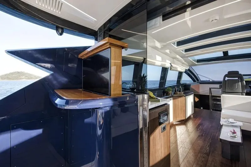 Slide: The Image of Luxurious interior of 2023 Lazzara LSX 67 yacht with modern design and ocean view. - 17