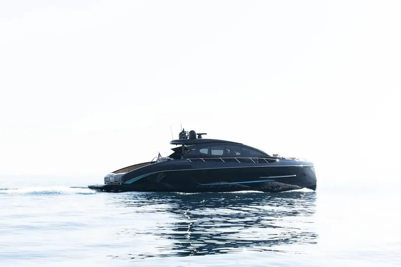 Slide: The Image of 2023 Lazzara LSX 67 yacht cruising on calm ocean waters. - 32