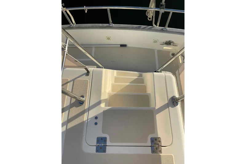 Slide: The Image of Staircase on 2002 President Trawler boat with metal railings and non-slip surface. - 82