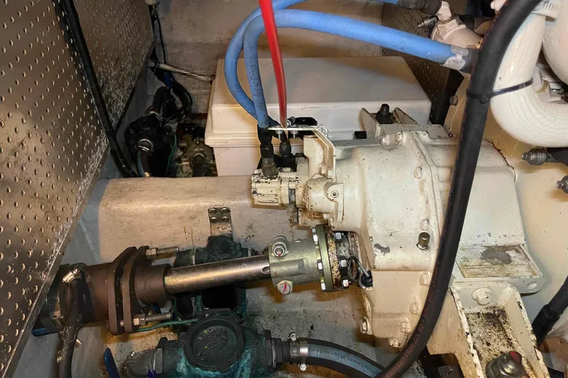 Slide: The Image of Engine room of a 2002 President Trawler with visible mechanical components. - 97