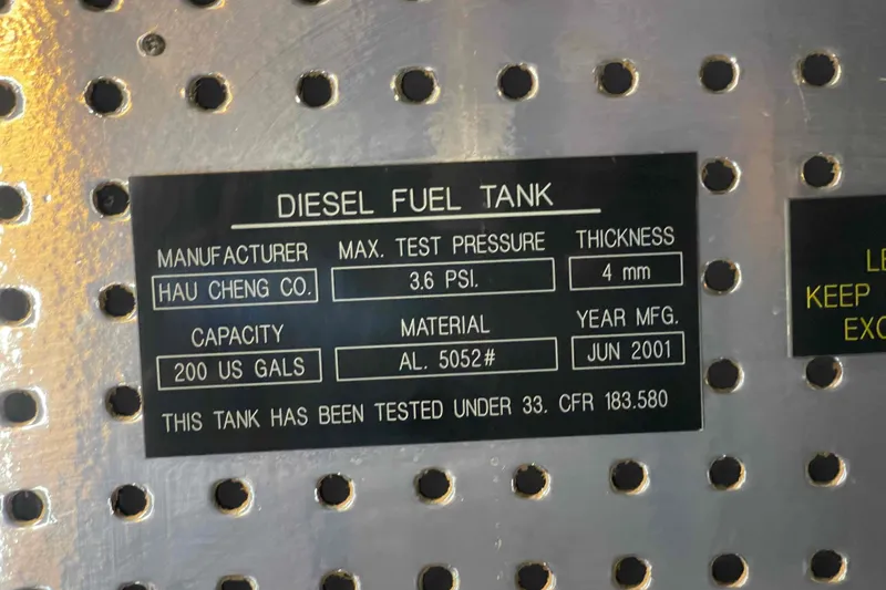 Slide: The Image of Label on diesel fuel tank, 2002 President Trawler, 200 US gallons, manufactured June 2001. - 108