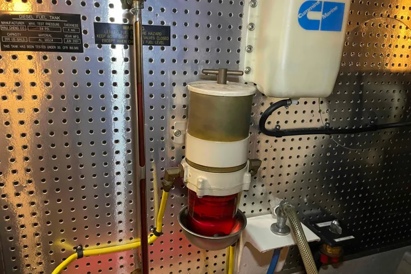 Slide: The Image of Engine room of a 2002 President Trawler with fuel filtration system. - 110