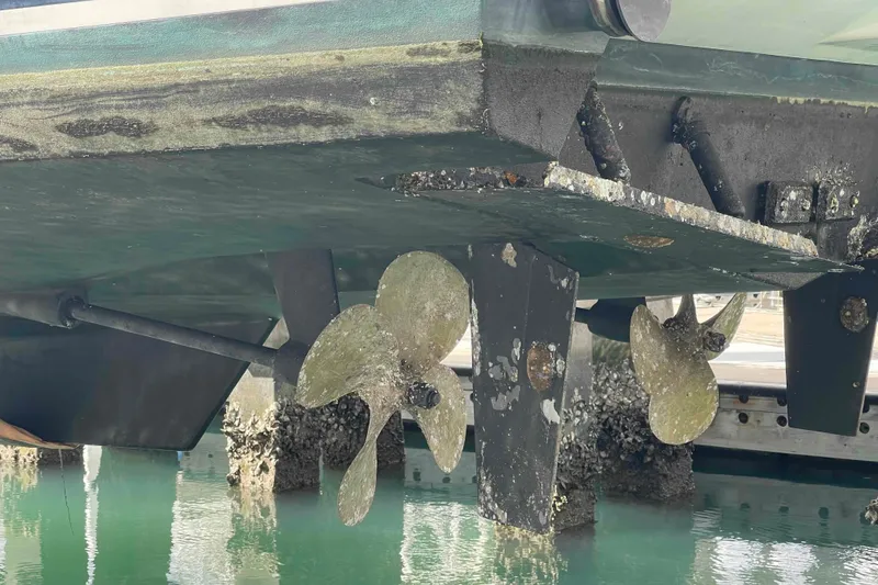Slide: The Image of Underwater view of a 2002 President Trawler's propellers and hull with marine growth. - 114